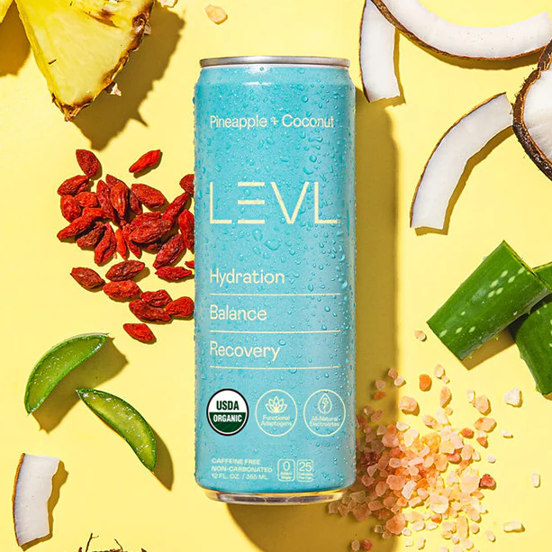 Pineapple + Coconut can among pineapple, coconut, aloe vera, goji berries and pink salt on yellow